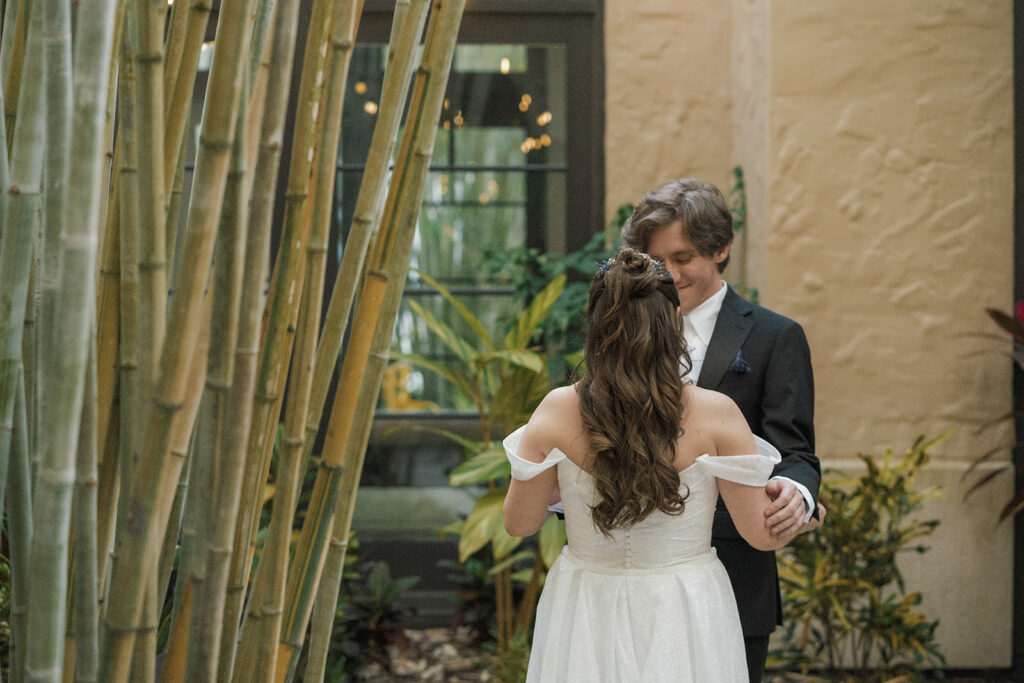 bride and groom first look alfond inn courtyard
