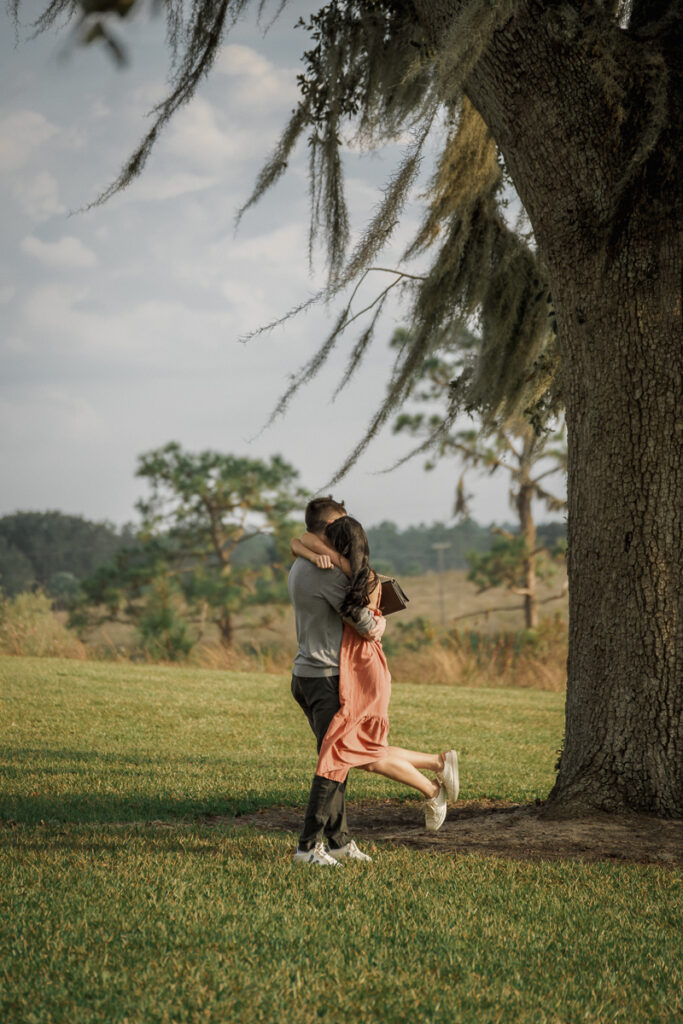 Surprise proposal photographer capturing the moments just after they said yes