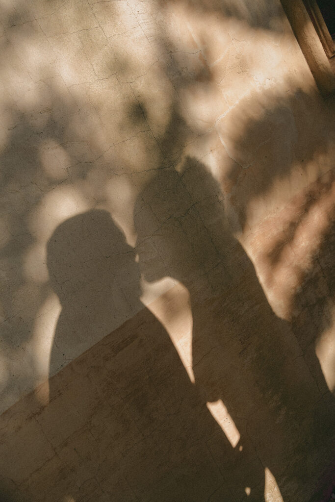 Couple kissing in golden hour light at Bok Tower Gardens, Central Florida elopement photography