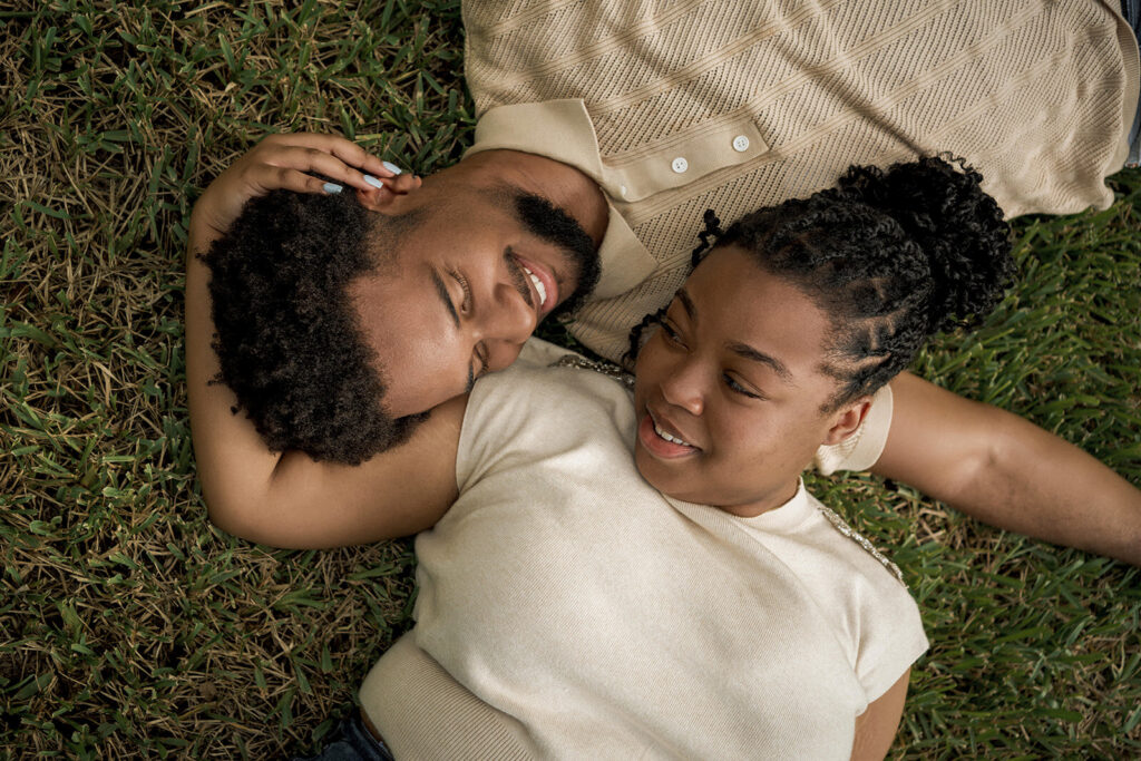 Couple celebrating after their surprise proposal, photographed by a surprise proposal photographer